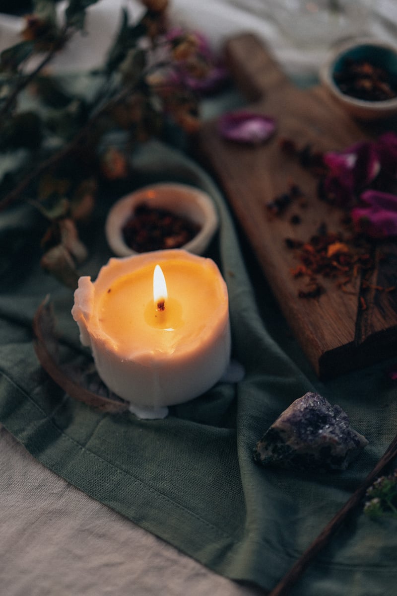 Dried Flowers and Lighted Candle